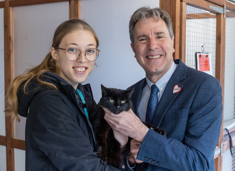Anna Colbourne left, Tosca the Cat Middle & Dan Norris, Metro Mayor for the West of England Combined Authority right